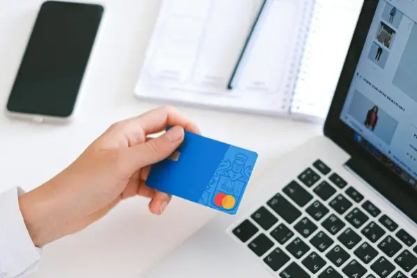 a person making an online purchase with a credit card