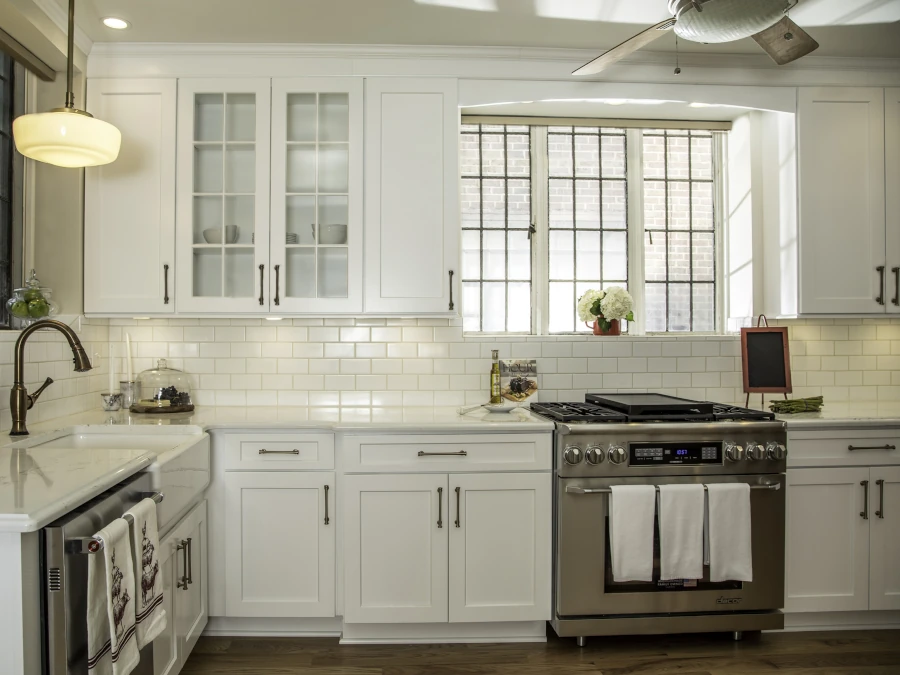 kitchen with assembled white shaker cabinets