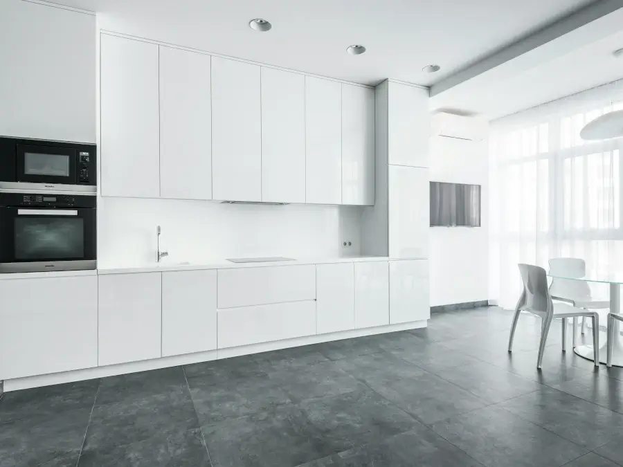 modern white kitchen with clean lines and flat front cabinets