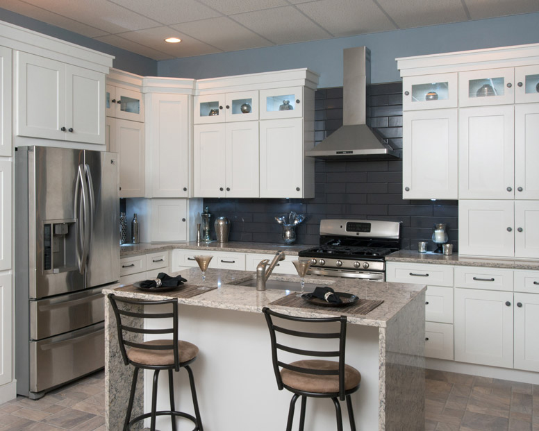 Kitchen with White Shaker Style Assembled Kitchen Cabinets